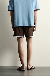CONTRAST HEM SHORTS
