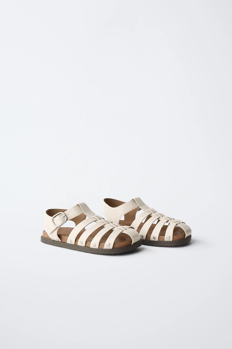 STUDDED FISHERMAN SANDALS