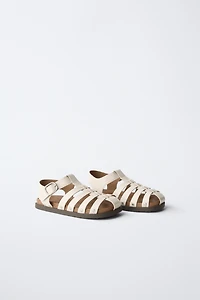 STUDDED FISHERMAN SANDALS