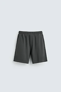 WASHED REGULAR FIT PIQUÉ SHORTS