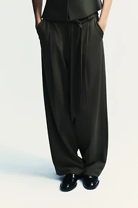 PLEATED BELTED PANTS