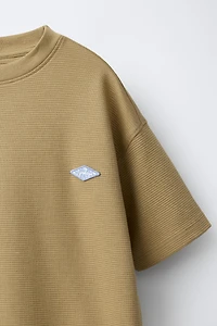 T-SHIRT OTTOMAN AVEC PIÈCE