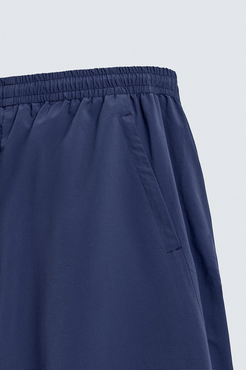 PANTALON TECHNIQUE À BANDES