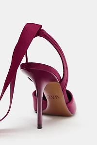 CHAUSSURES OUVERTES À TALONS ET BRIDES