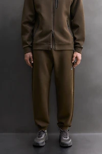PANTALON TECHNIQUE À FERMETURE ÉCLAIR
