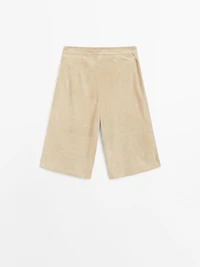 Bermuda long en cuir finition daim