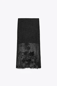 JUPE SEMI-TRANSPARENTE EN MAILLE STRUCTURÉE