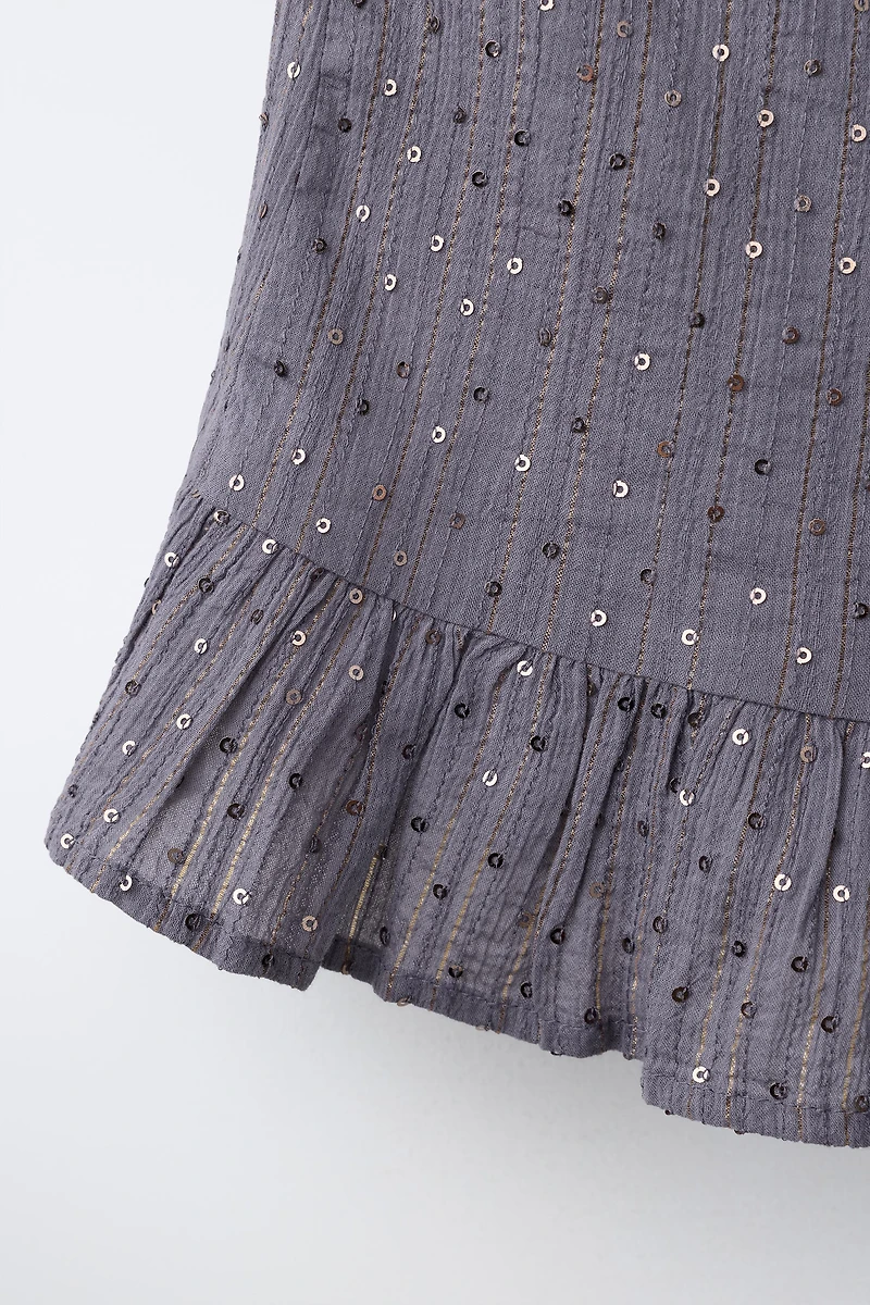 DRAPED SEQUIN SKIRT