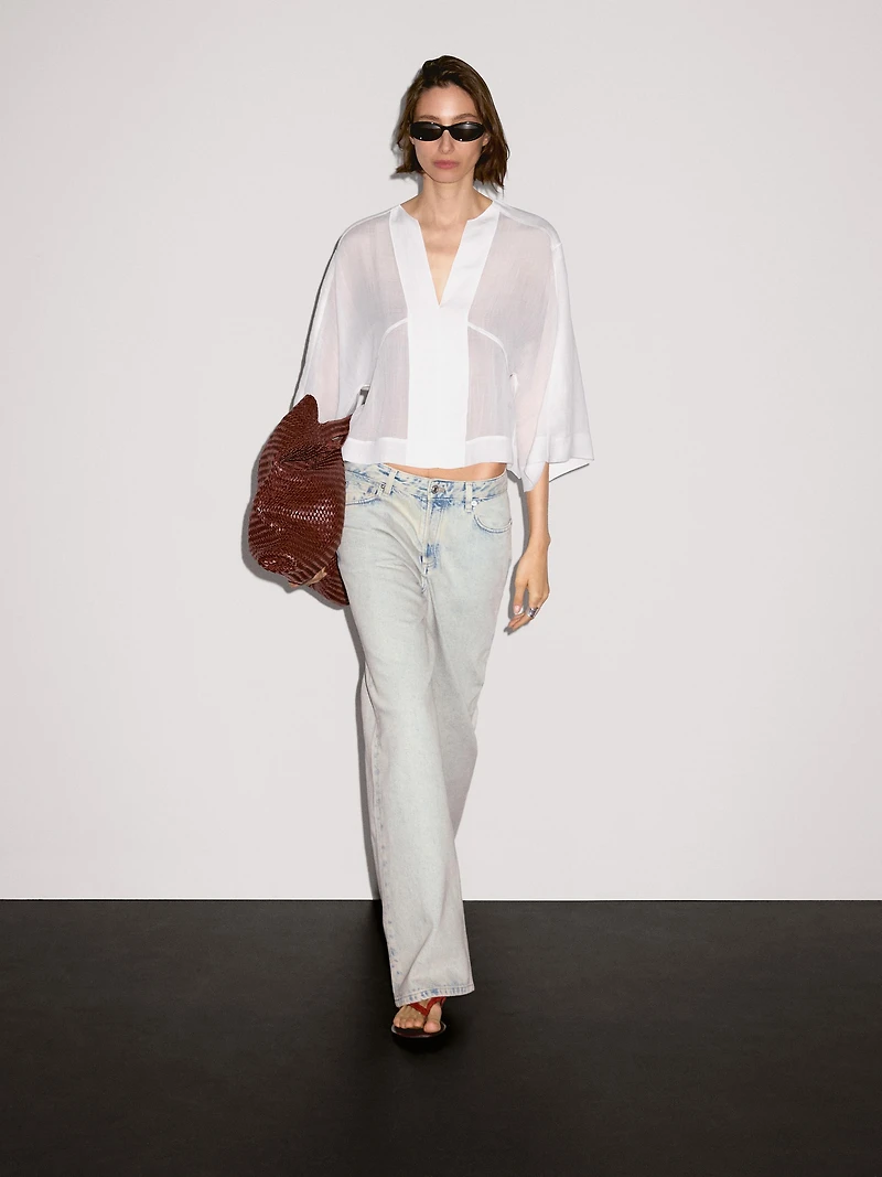 Flowing linen blend blouse with seam details