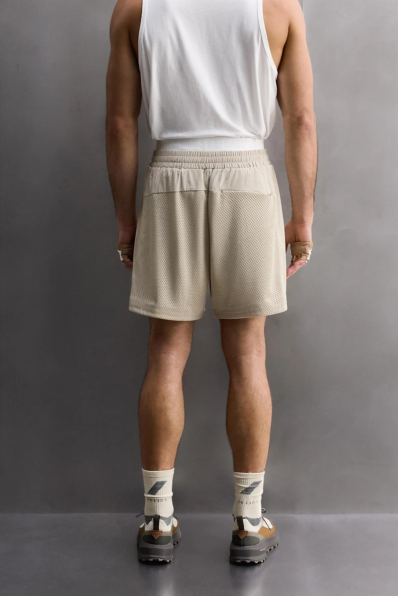 COMBINED PERFORATED SHORTS