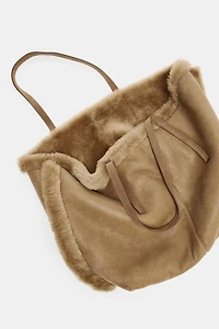 REVERSIBLE LEATHER BAG