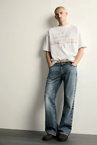 T-SHIRT EN MAILLE À IMPRIMÉ DÉLAV