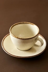 PORCELAIN TEACUP WITH ANTIQUE FINISH RIM