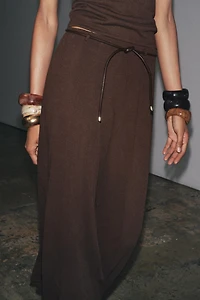 CUT-OUT KNIT SKIRT WITH BELT