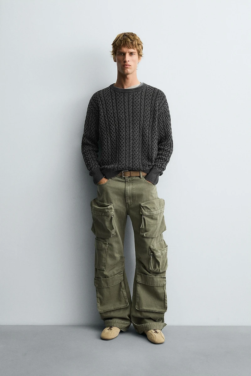 GARMENT-DYED CABLE KNIT SWEATER