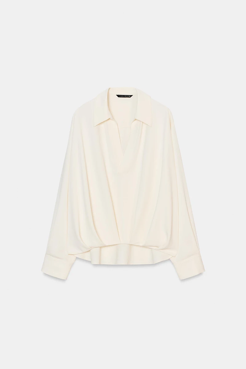 ASYMMETRIC PLEATED HEM SHIRT