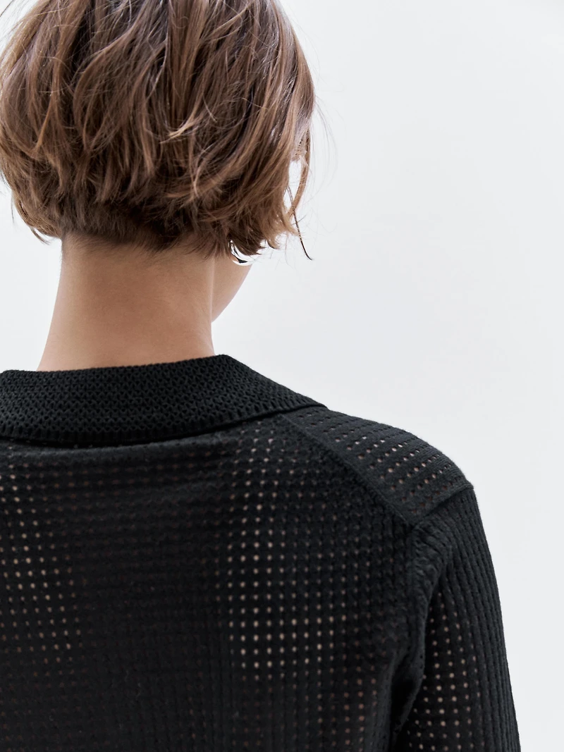 Pull en maille ajourée à col polo