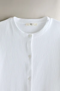 T-SHIRT MANCHES LONGUES BOUTONS