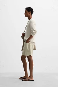 WASHED COTTON BERMUDA SHORTS