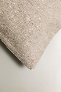 HOUSSE DE COUSSIN SURPIQÛRE