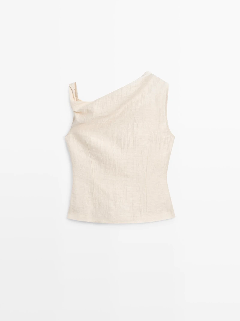 Asymmetric top with knot detail