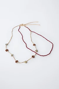 TWO-PACK OF BEADED FLOWER NECKLACES