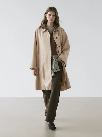 Cape trench coat with hood