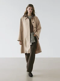Cape trench coat with hood