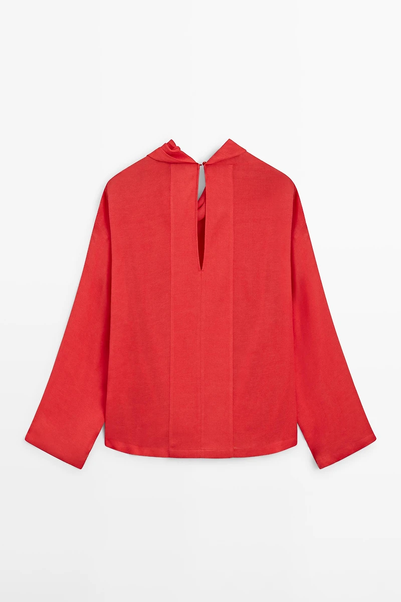 Blouse fluide à col drapé