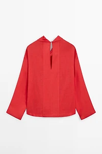 Blouse fluide à col drapé
