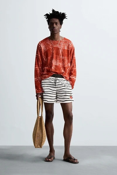 OTIS KWAME KYE QUAICOE PRINTED MID-LENGTH SWIMSUIT