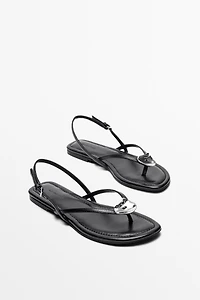 Flat slider sandals with gem detail