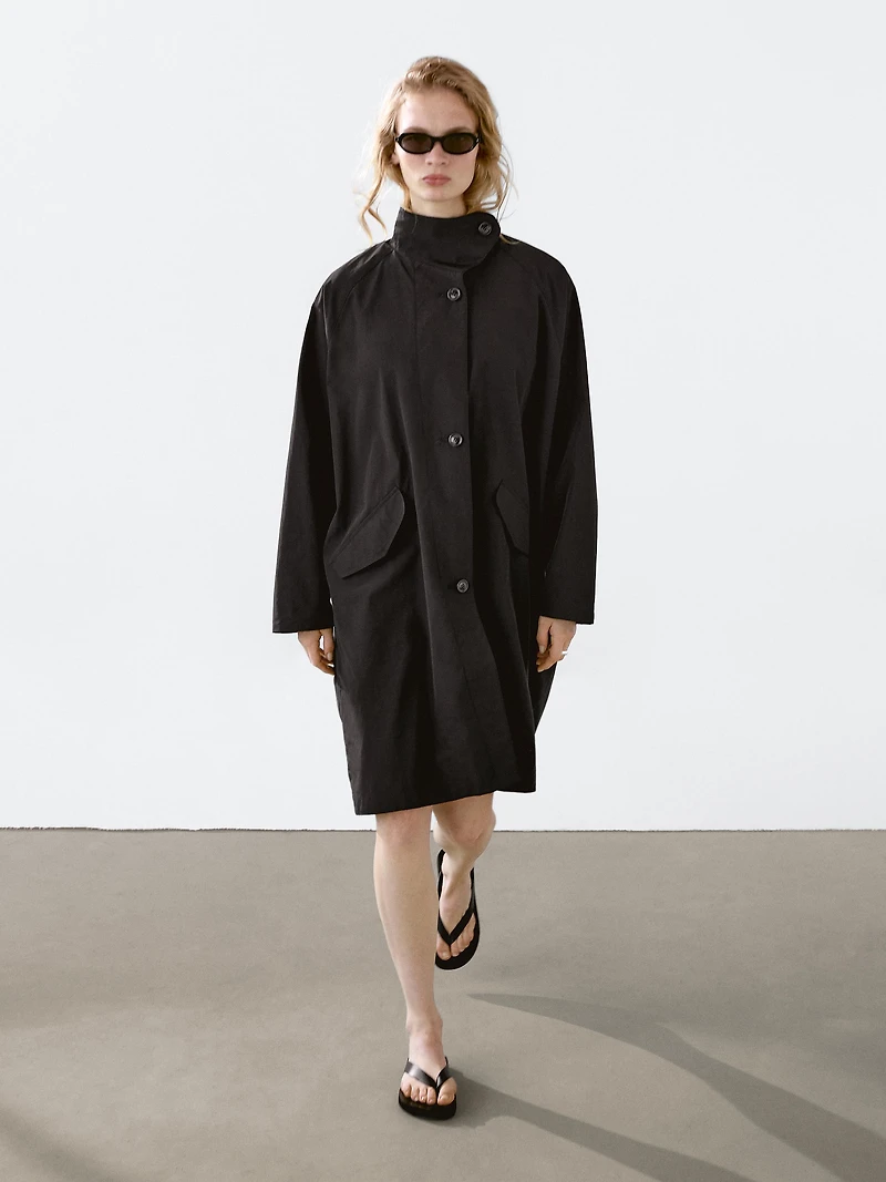 Oversize flowing trench coat water-repellent fabric