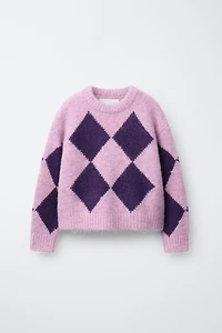 PULL EN MAILLE À LOSANGES