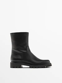 Track sole flat ankle boots