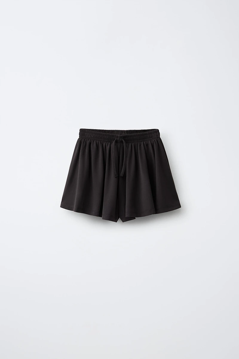 FLOWY GYM SHORTS