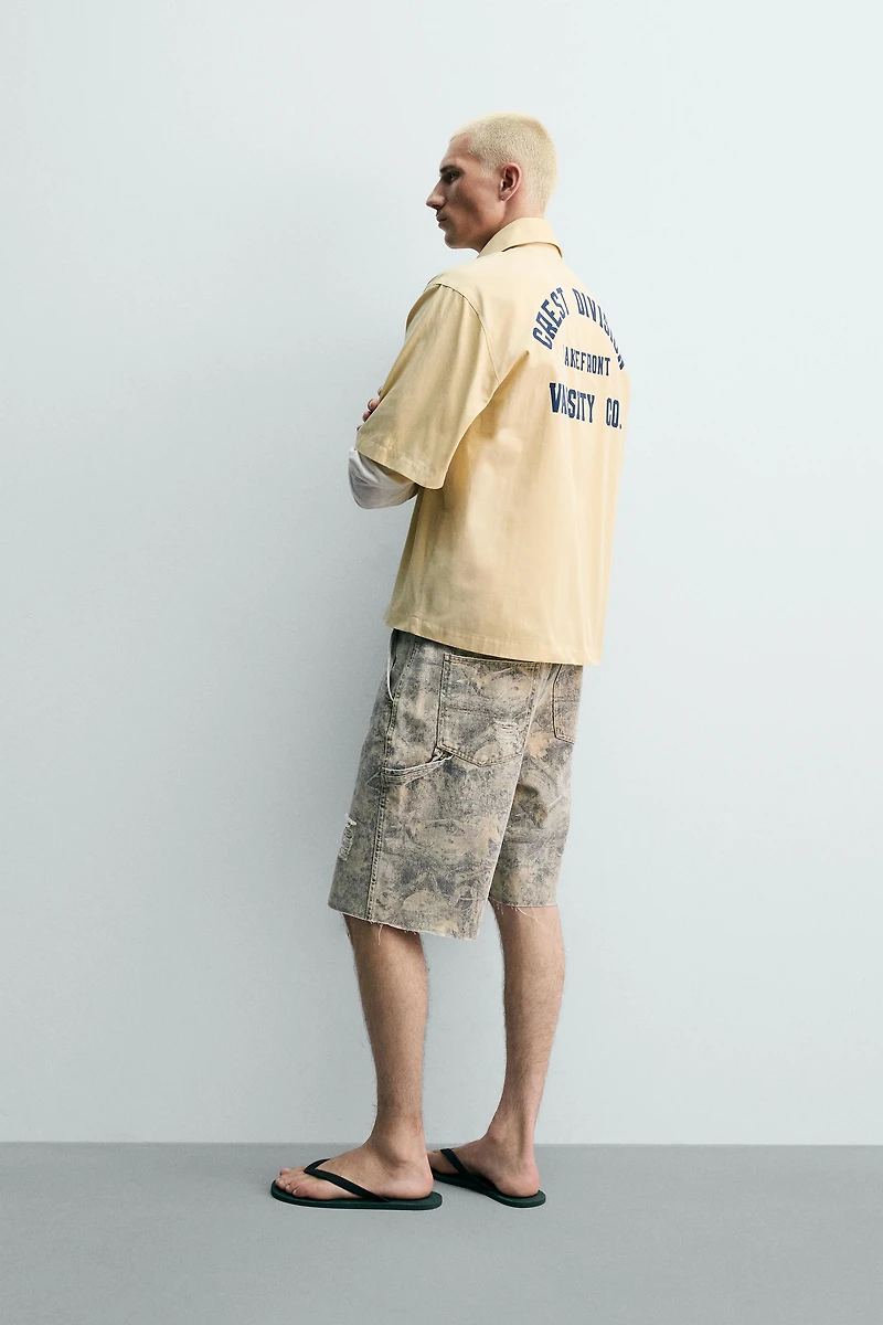 PRINTED TEXT BOXY FIT SHIRT