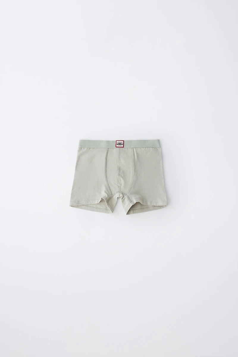 6-14 ANS / LOT DE CINQ BOXERS À ÉTIQUETTE