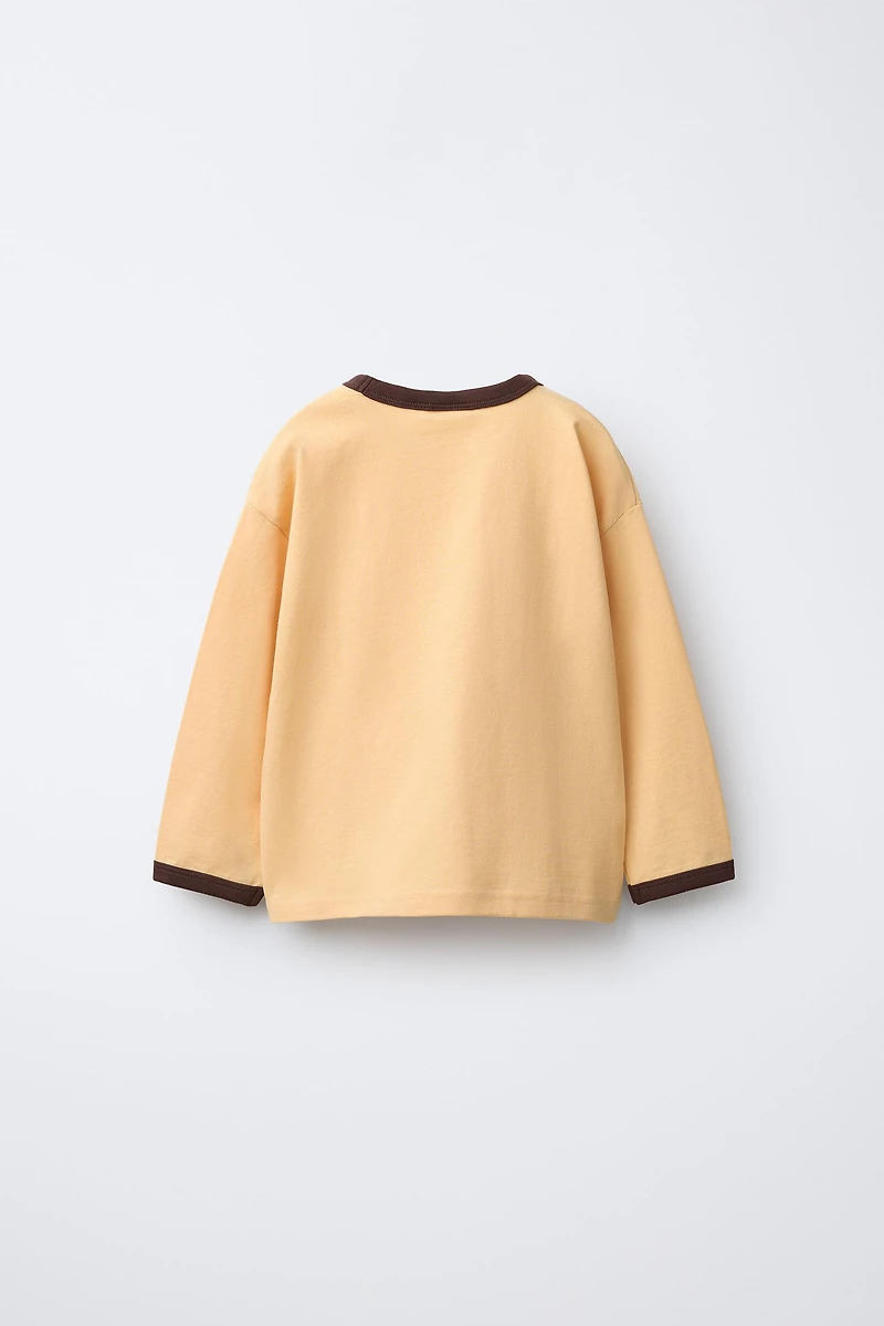 PLAIN T-SHIRT WITH CONTRASTING PIPING AT NECKLINE