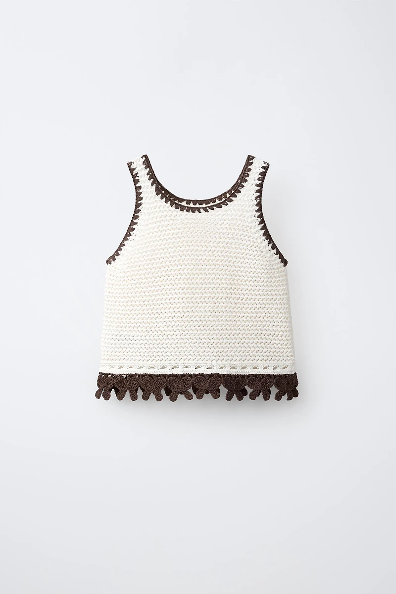 TOP EN MAILLE AVEC NŒUDS CONTRASTE