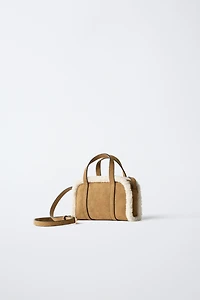 SAC BANDOULIÈRE EN PEAU DE MOUTON