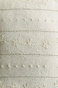 CHILDREN'S THROW PILLOW WITH FLORAL EMBROIDERY