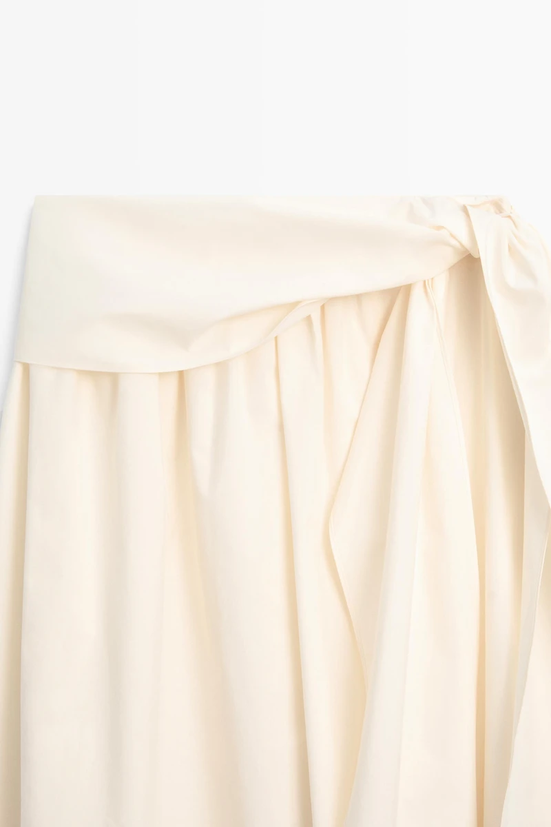 Flowing skirt with scarf detail