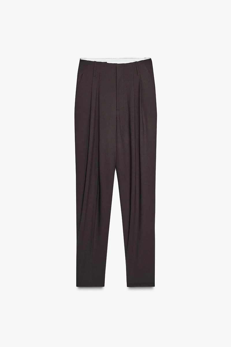 PLEATED PANTS WITH BUTTON HEM