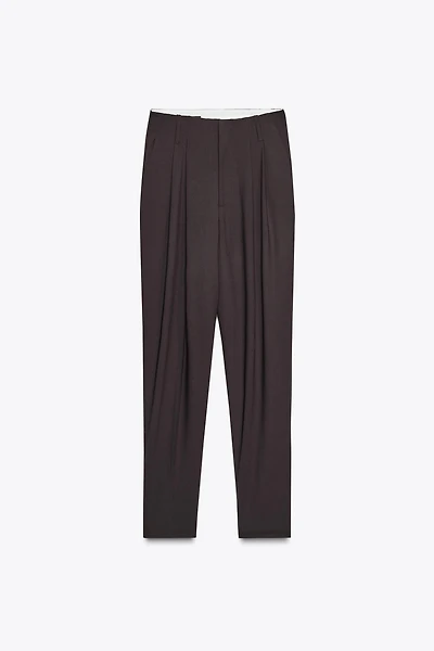 PLEATED PANTS WITH BUTTON HEM