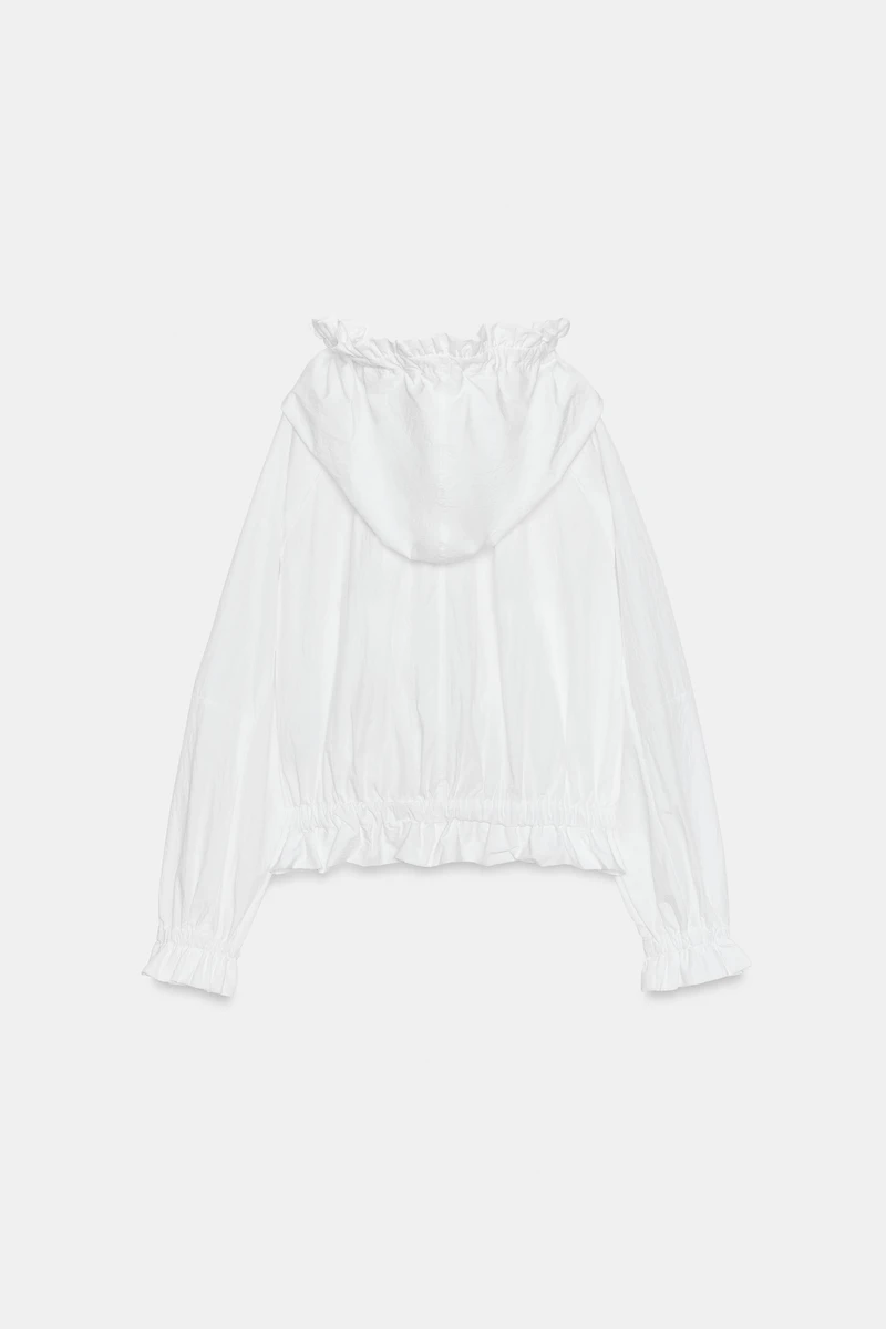 VESTE ZIPPÉE À VOLANTS