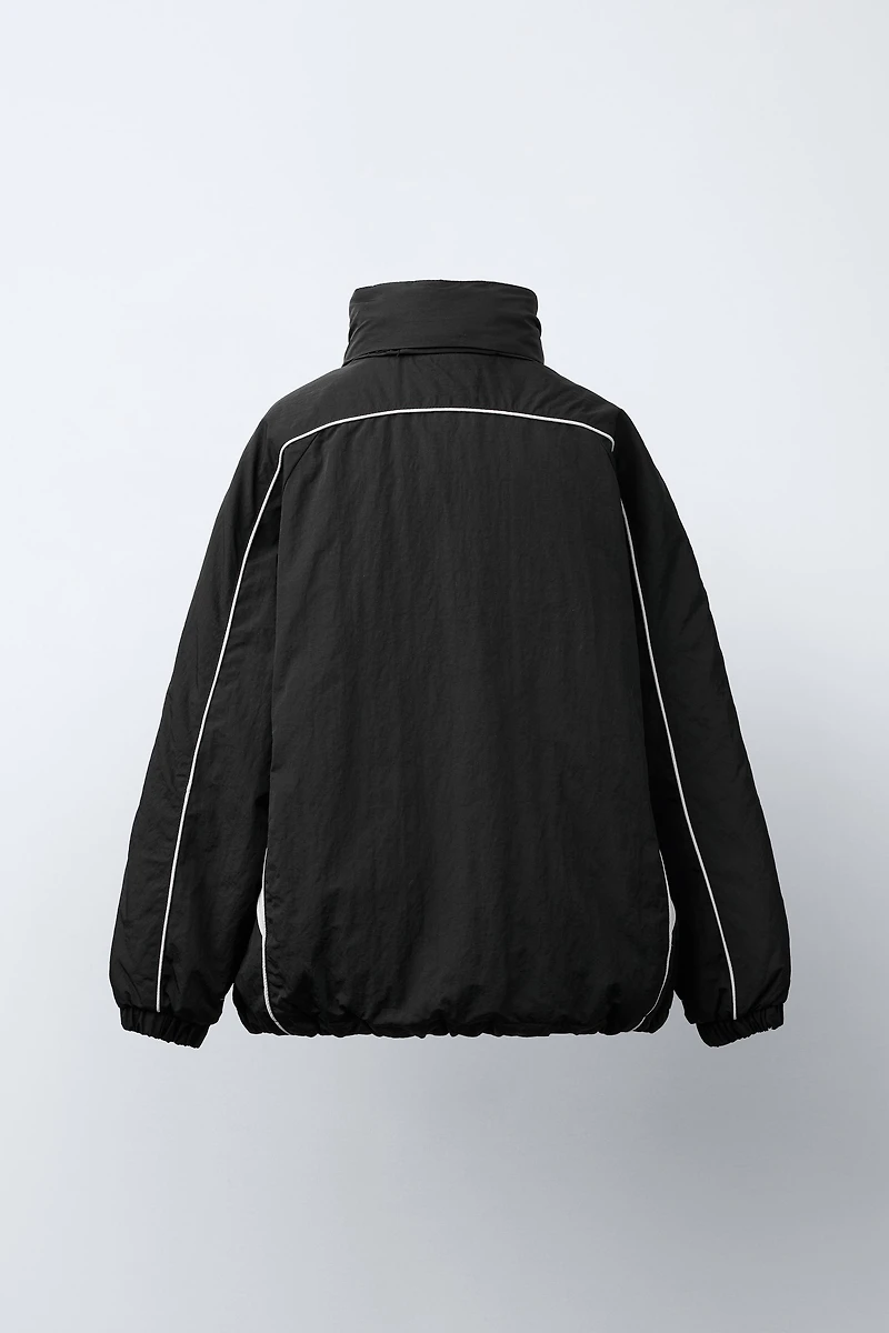 UEFA CHAMPIONS LEAGUE ® WATER REPELLENT JACKET WITH HOODIE