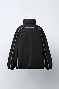 UEFA CHAMPIONS LEAGUE ® WATER REPELLENT JACKET WITH HOODIE
