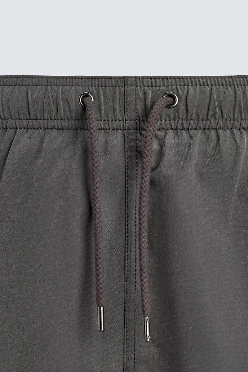 METALLIC EYELET SWIMSUIT