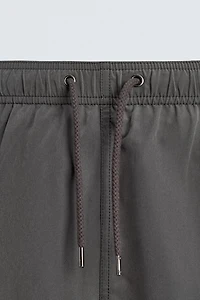METALLIC EYELET SWIMSUIT